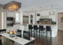 Chandelier in the kitchen living room in a modern style in the interior