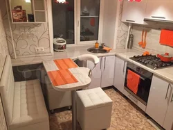 Kitchen design in Khrushchev with a sofa