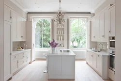 White kitchen design with window