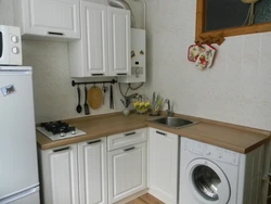 Kitchen renovation in Khrushchev with refrigerator and washing machine photo