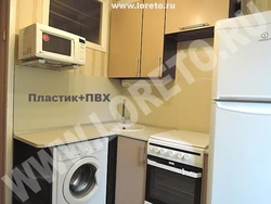 Kitchen renovation in Khrushchev with refrigerator and washing machine photo