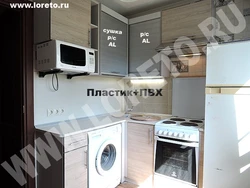 Kitchen renovation in Khrushchev with refrigerator and washing machine photo