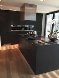 Dark brown floor in the kitchen interior