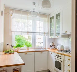 Small kitchen design with window