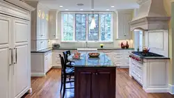 Kitchen design in a house with a window in the middle