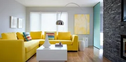 Yellow sofa in the bedroom interior