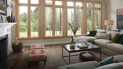 Living room design in a house with large windows photo