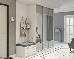 Sliding wardrobe in the hallway design white