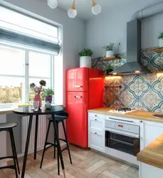 Kitchen with red refrigerator interior photo