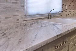 Marble countertop for the kitchen photo in the kitchen interior