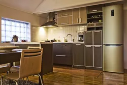 Beige refrigerator in the kitchen photo
