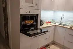 Photo of a kitchen with a pencil case for an oven