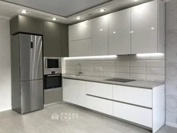 Glossy kitchen in a modern style photo white