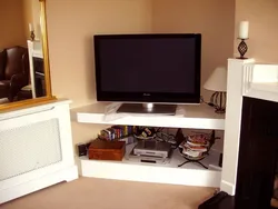 Телевизор в углу в гостиной фото