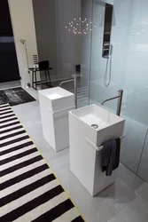 Bathtub interiors with floor-mounted sink
