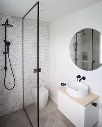 Black shower cabin in the bathroom photo
