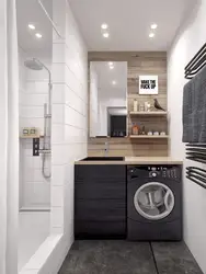 Photo Of A Bath With Shower, Sink And Washing Machine