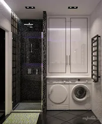 Photo of a bath with shower, sink and washing machine