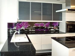 Apron for black glossy kitchen photo