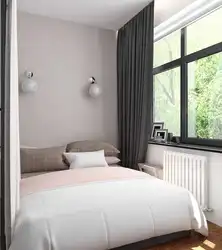 Bedroom design with one window opposite the door photo