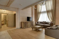 Living room design for a wooden house made of timber
