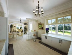Design of a living room combined with a kitchen and access to the terrace