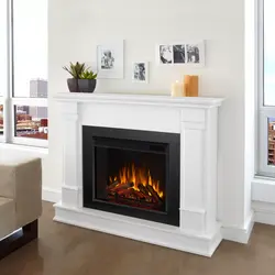 White fireplace in the apartment photo