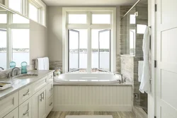 Bathroom design with a window in a country house