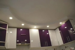 Photo of two-level plasterboard ceilings in the kitchen with lighting