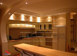 Photo of two-level plasterboard ceilings in the kitchen with lighting