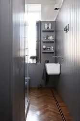 Bathroom design with shower in gray tones