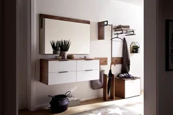 Hallway Interior With Chest Of Drawers And Mirror