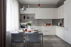 Kitchen interior in an apartment in gray tones