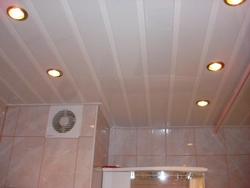Step-by-step photo of a bathroom ceiling made of plastic panels