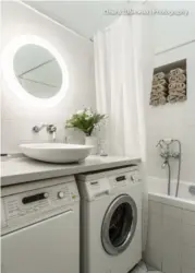 Bathroom interior with countertop for washing machine