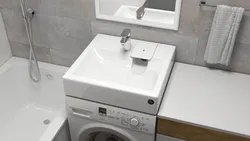 Install a washing machine in the bathroom under the sink photo