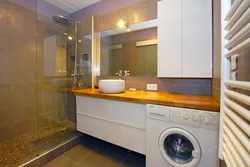 Bath Interior With Washing Machine And Countertop