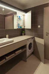 Bath interior with washing machine and countertop