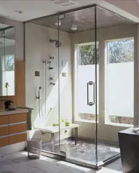 Душ кабинасының фотосуреті бар ванна бөлмесінің дизайны