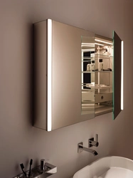 Bathroom cabinet with mirror with lighting photo