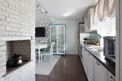 Wallpaper brick in the kitchen photo in the interior