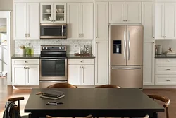 Kitchen design with beige refrigerator