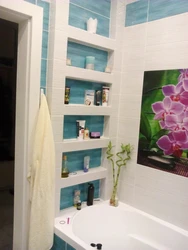 Tile shelves in the bathroom in the wall photo