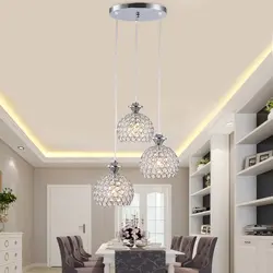 Chandelier for the kitchen on a suspended ceiling in a modern style photo