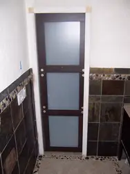 Photo of doors in a small bath