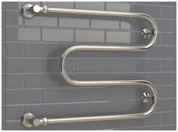 Photo of stainless steel bathroom heated towel rails