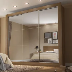 Photo of built-in wardrobes in the bedroom with mirrors