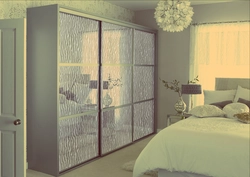 Photo Of Built-In Wardrobes In The Bedroom With Mirrors