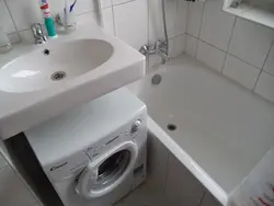 Design Of A Small Bathroom With A Sink Above The Washing Machine