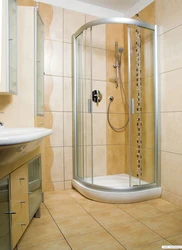 Photo of the interior of a bathtub with a shower corner
